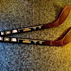 Mini Boston Bruins Hockey Sticks. Unsigned